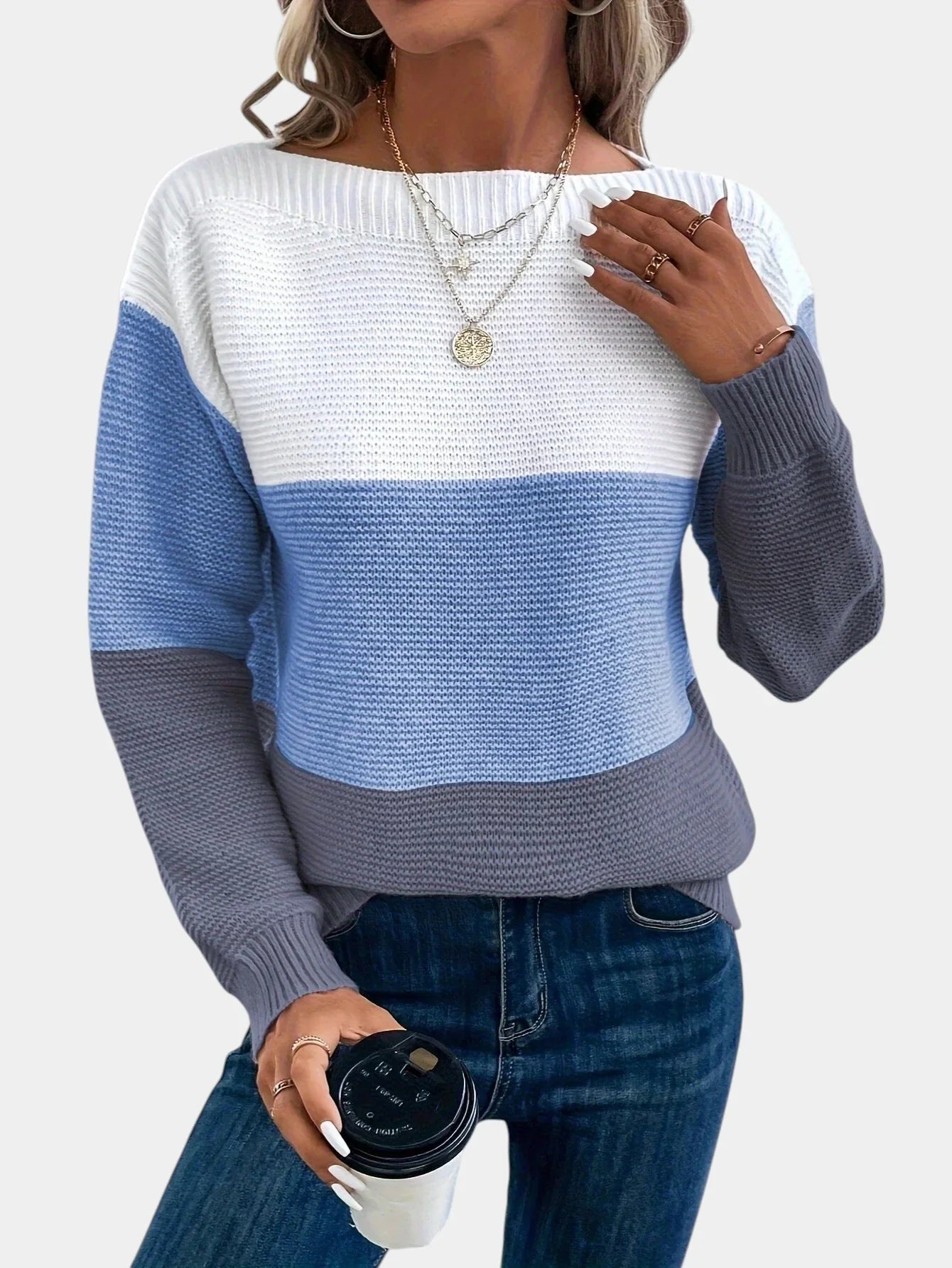 Two-tone knit pullover with crew neck, white upper to blue gradient hem