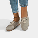 Gray suede lace-up loafers with stitch-trimmed apron toe and low profile sole.