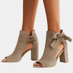 Khaki heeled sandals with peep toe, ankle bow, and block heel