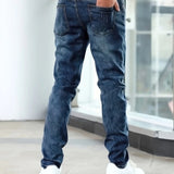 Dark blue casual stretch jeans, rear view with five-pocket construction and belt loops