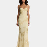 Floor-length yellow floral lace dress with spaghetti straps and fitted silhouette