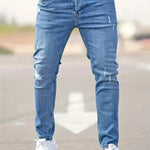 Slim-fit ripped jeans in medium blue, ripped knee rips and zip fly
