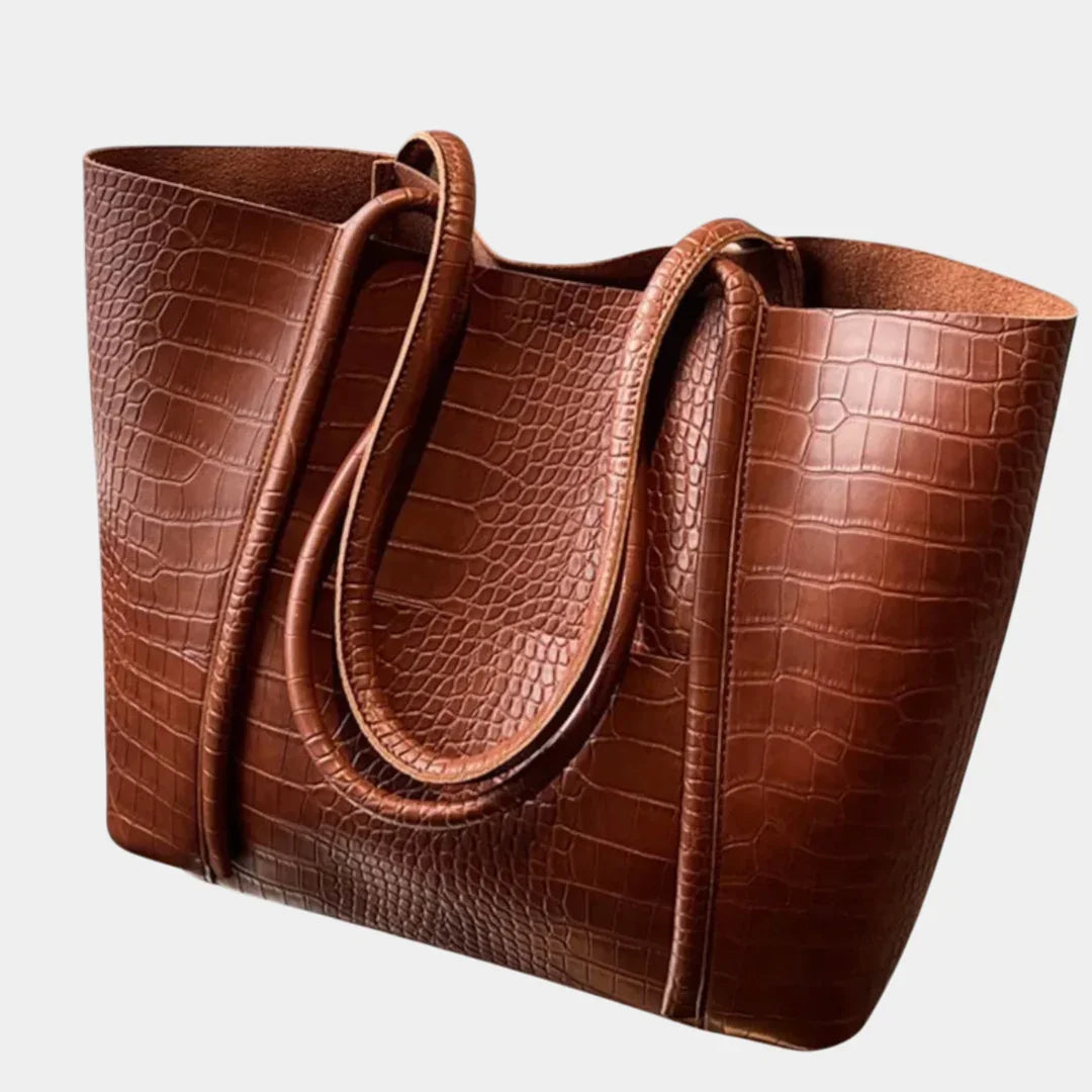 Dark brown croc-embossed leather tote bag with rounded top handles and open top
