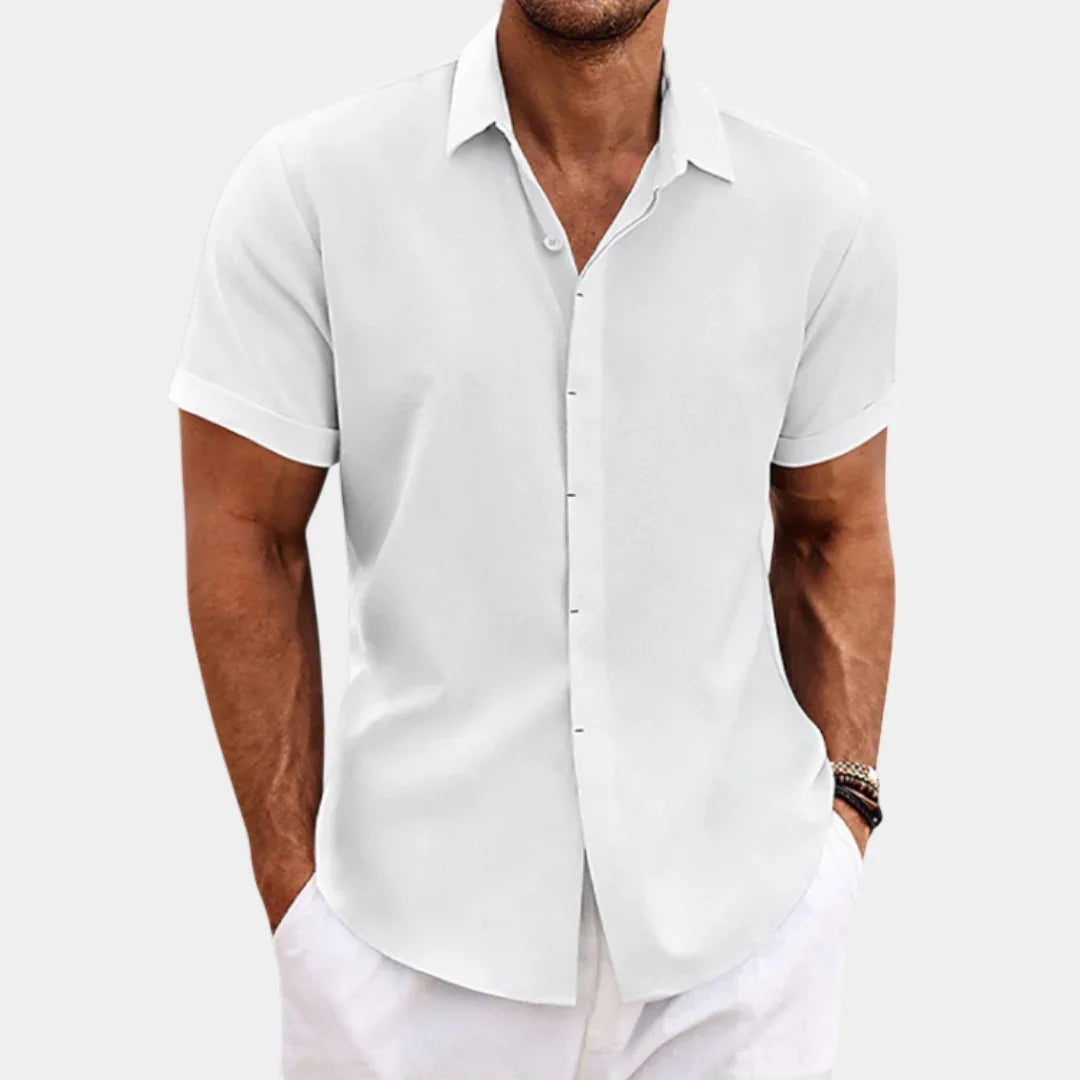 White short-sleeve button-up summer shirt with pointed collar and straight hem.