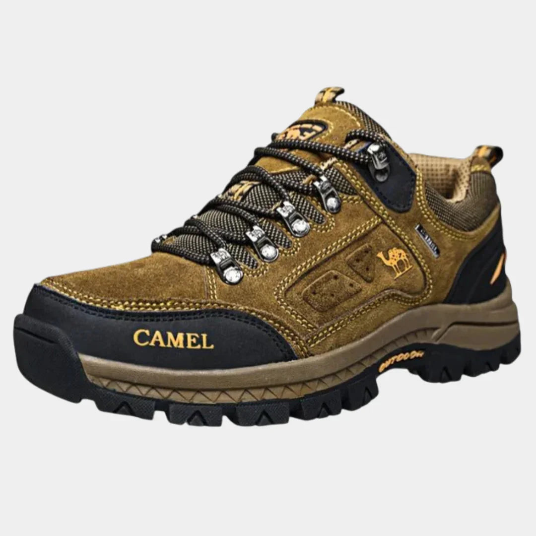 Brown suede mountain boots with black panels, lace-up, padded collar, rugged outsole