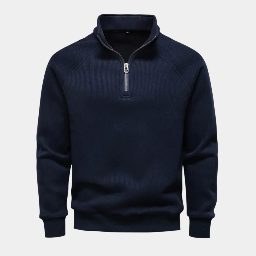Men's navy quarter-zip sweater with stand collar and ribbed cuffs and hem.