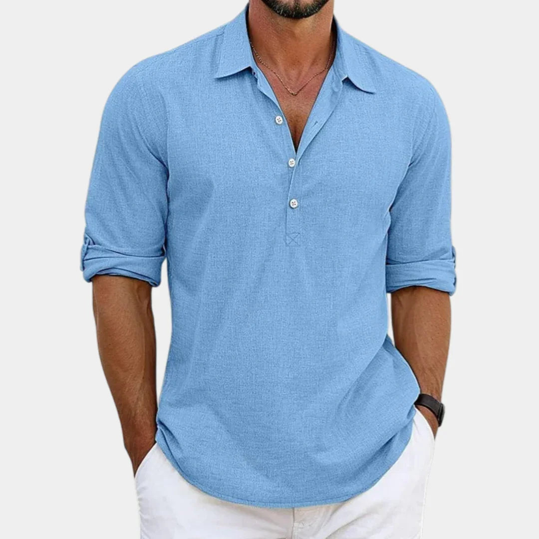 Men's blue linen button-up shirt with short sleeves and open collar