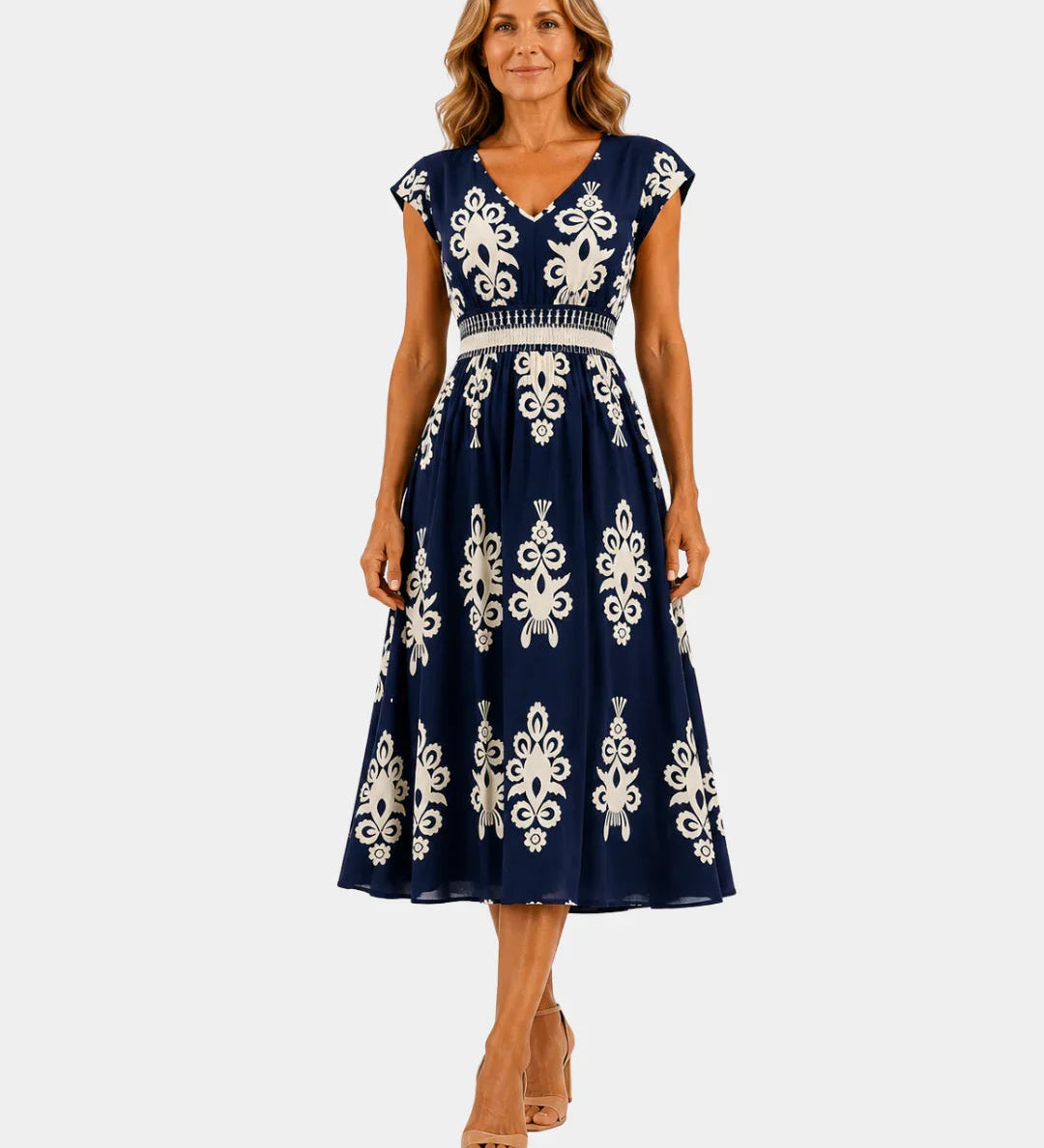 Navy baroque-inspired midi dress with white ornate embroidery, V-neck, cap sleeves, belt