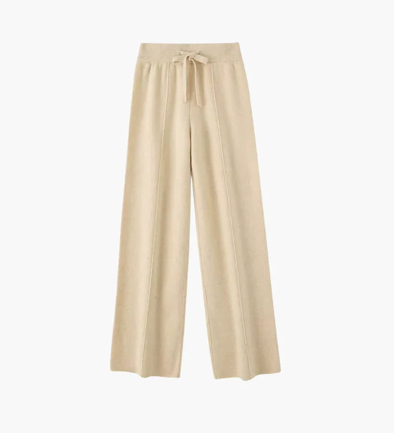 Pure merino wool trousers in cream with elastic drawstring waist and wide legs