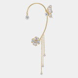 Gold magical ear cuff with butterfly and flower charms, dangling chain tassel