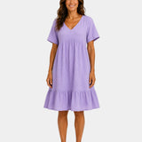 Purple textured V-neck midi dress with short sleeves and tiered skirt