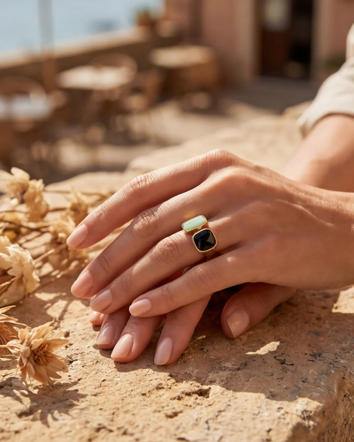 Gold-tone double-stone adjustable ring with mint oval and dark square bezel