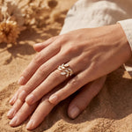 Gold leaf motif adjustable ring on hand, slim band