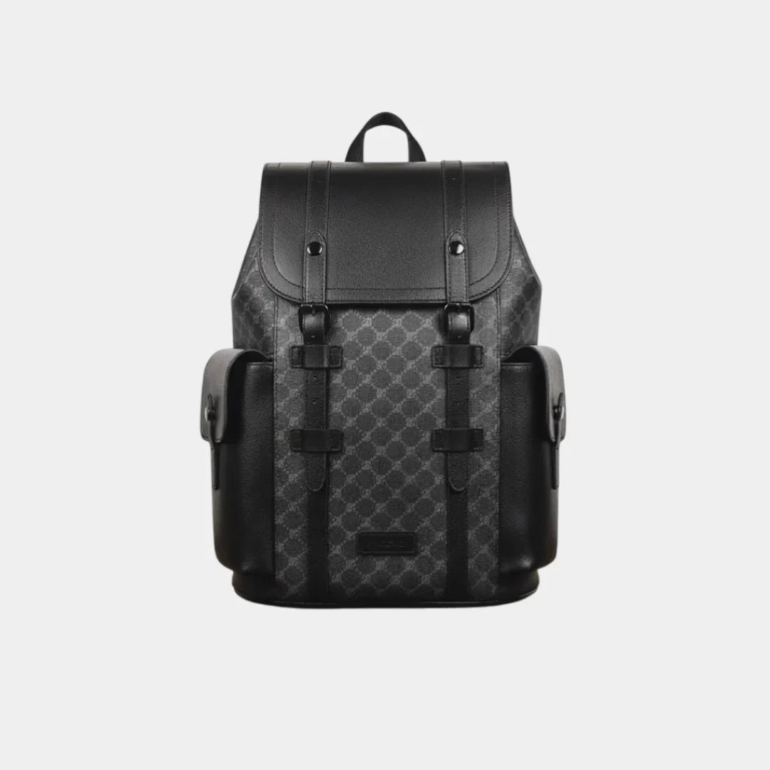 Black leather backpack with top flap, front buckles, and side storage pockets