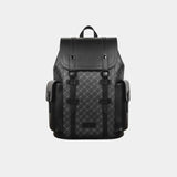 Black leather backpack with top flap, front buckles, and side storage pockets