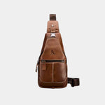 Tan leather chest bag with front zipper pocket and adjustable crossbody strap