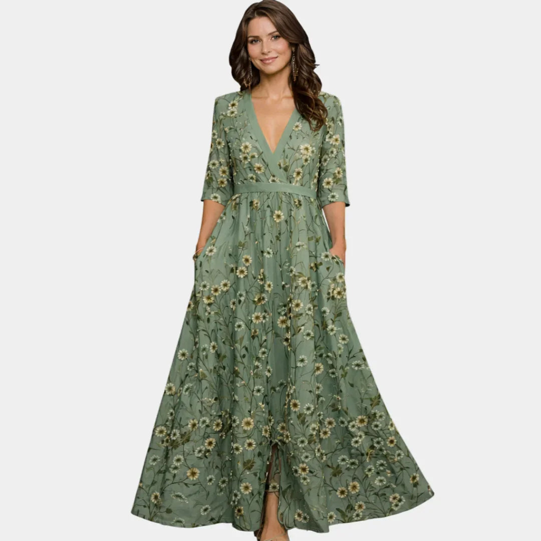 Floral maxi dress with V-neck, green floral print, waist tie, and 3/4 sleeves