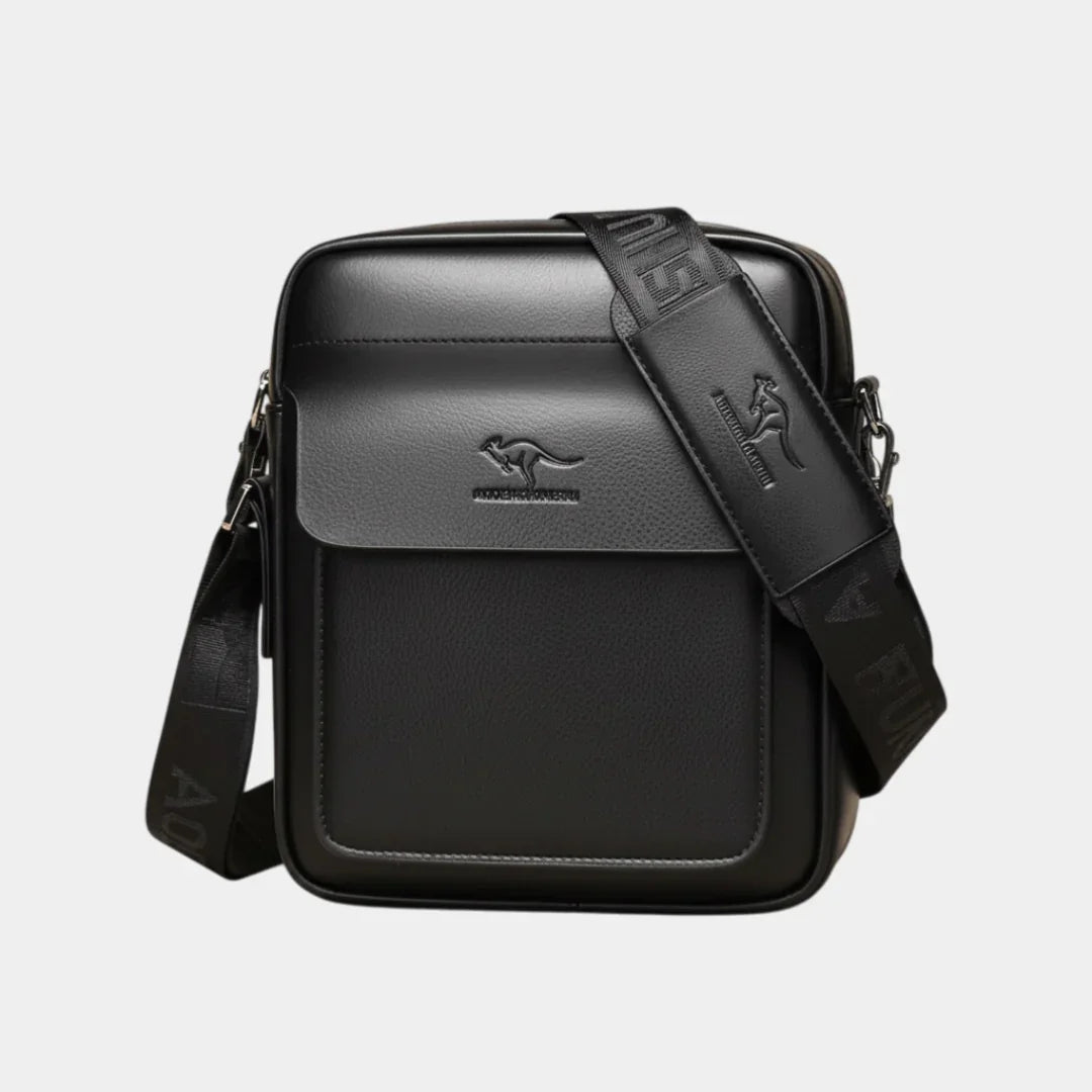 Black leather shoulder bag with front flap and patterned strap detail