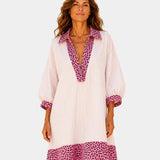 Leopard print V-neck striped dress in white with pink leopard collar and hem