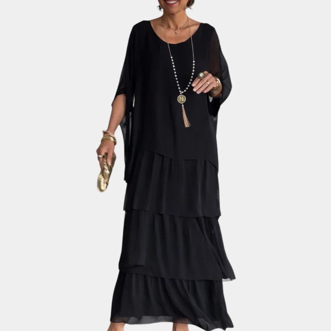 Black tiered maxi dress with loose short sleeves and layered skirt tiers