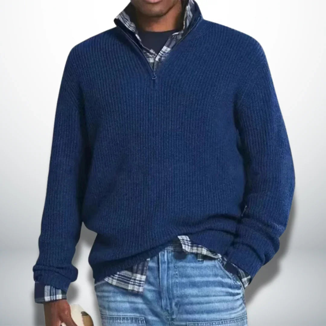 Dark blue knit quarter-zip sweater with ribbed cuffs and hem.