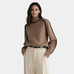 Brown knit turtleneck sweater with long sleeves and ribbed cuffs