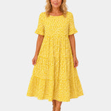 Yellow polka dot lightweight dress with short sleeves and gathered waist