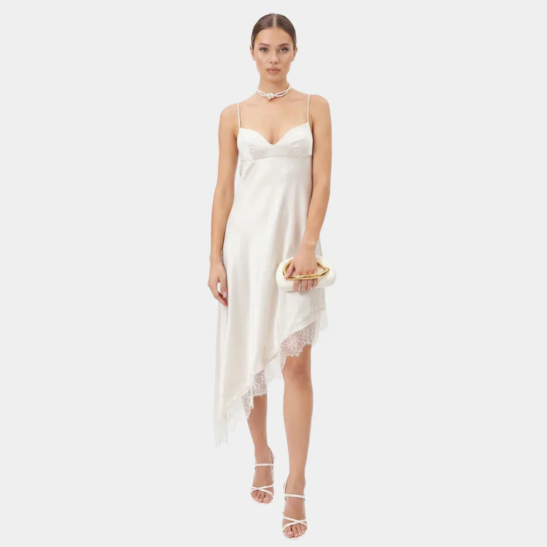 Women's white satin slip dress with lace-trim asymmetric hem