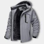 Light gray winter jacket with hood and zip front, showing dark inner fleece layer