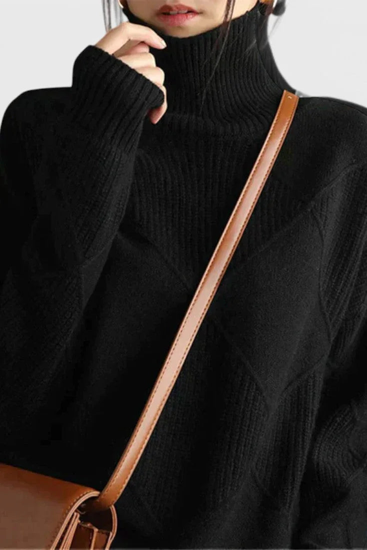 Black turtleneck sweater with ribbed collar and long sleeves