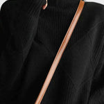 Black turtleneck sweater with ribbed collar and long sleeves