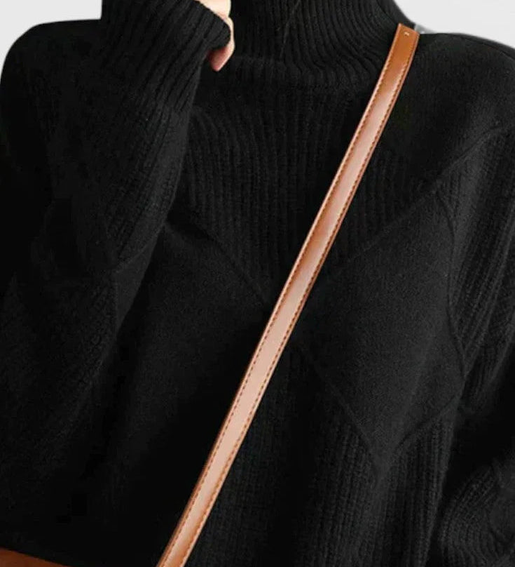 Black turtleneck sweater with ribbed collar and long sleeves