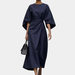 Navy blue maxi dress with kimono sleeves and waist tie belt, draped wrap-style skirt