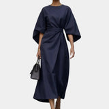 Navy blue maxi dress with kimono sleeves and waist tie belt, draped wrap-style skirt