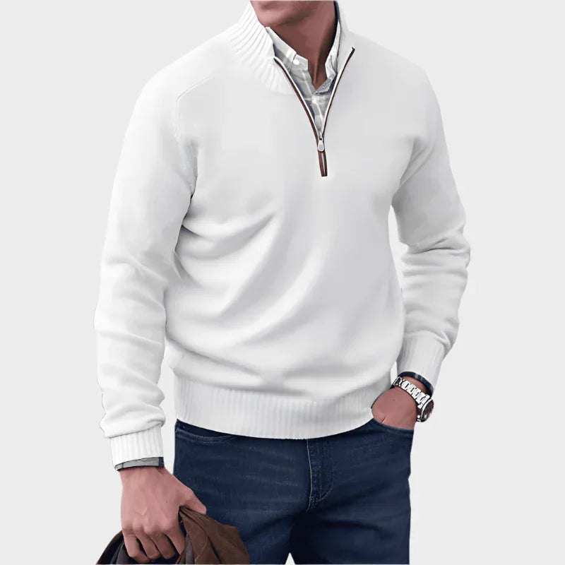 White half-zip knit sweater with ribbed collar, cuffs, and hem.