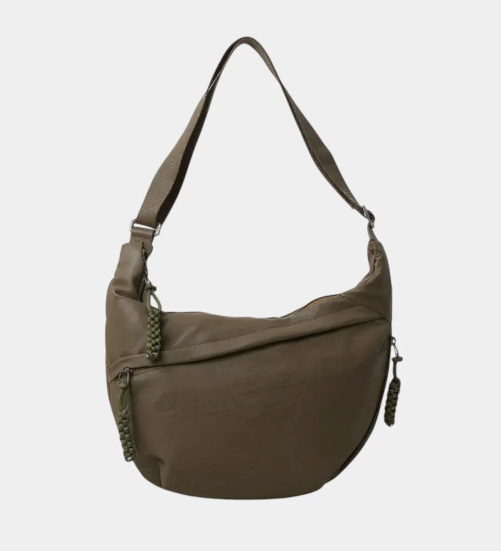 Olive anti-theft crossbody bag with curved hobo shape, adjustable strap, and side zipper pull.