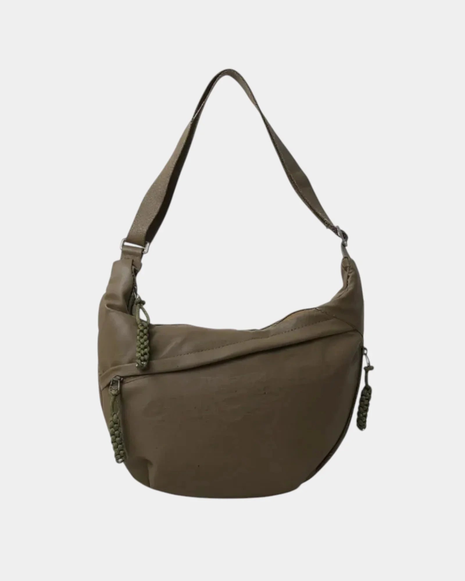 Olive anti-theft crossbody bag with curved hobo shape, adjustable strap, and side zipper pull.