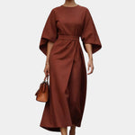 Brown maxi dress with kimono sleeves and waist tie belt, draped wrap-style skirt