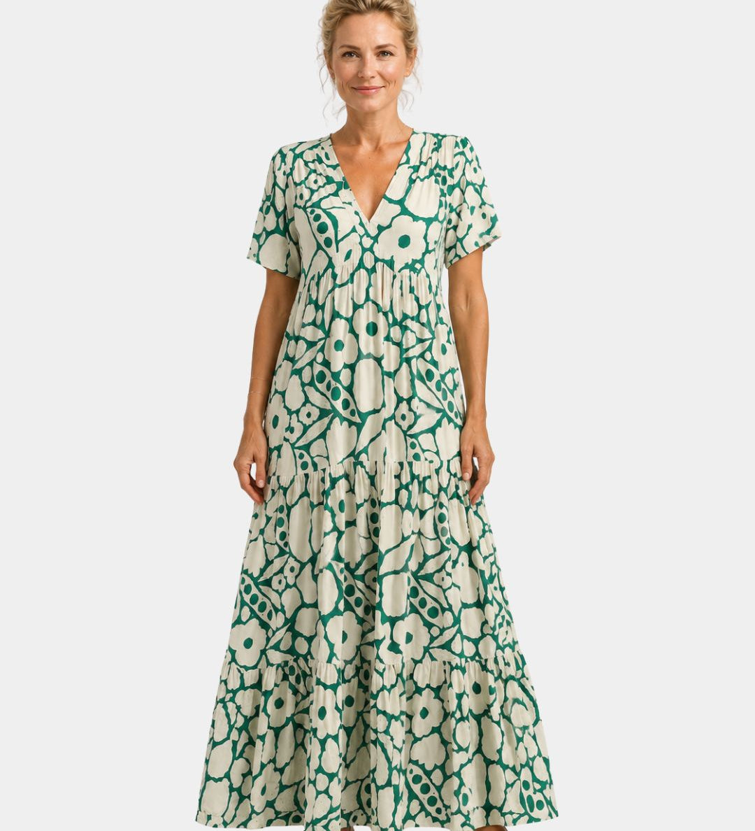 Green floral maxi dress with V-neck, short sleeves, and tiered skirt