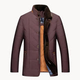 Burgundy quilted winter jacket with snap front, brown trim, and plaid-lined interior