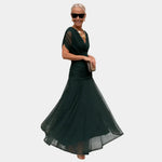 Long dark green dress with V-neck and flared tulle skirt, short sleeves