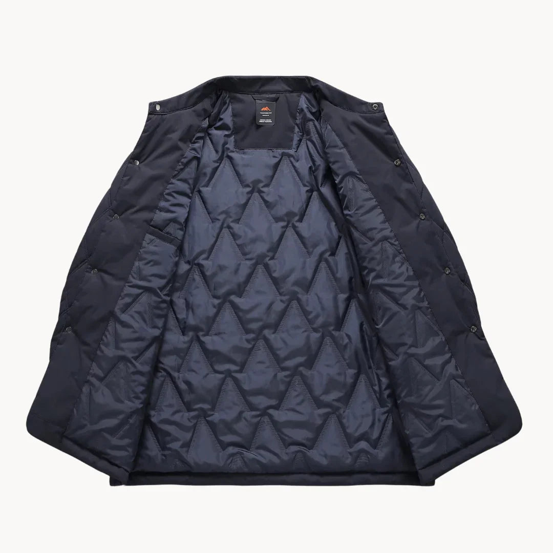 Navy quilted coat, back view, diamond-quilted shell