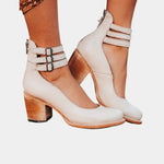 White ankle-strap block heel shoes with two straps and buckle, pointed toe