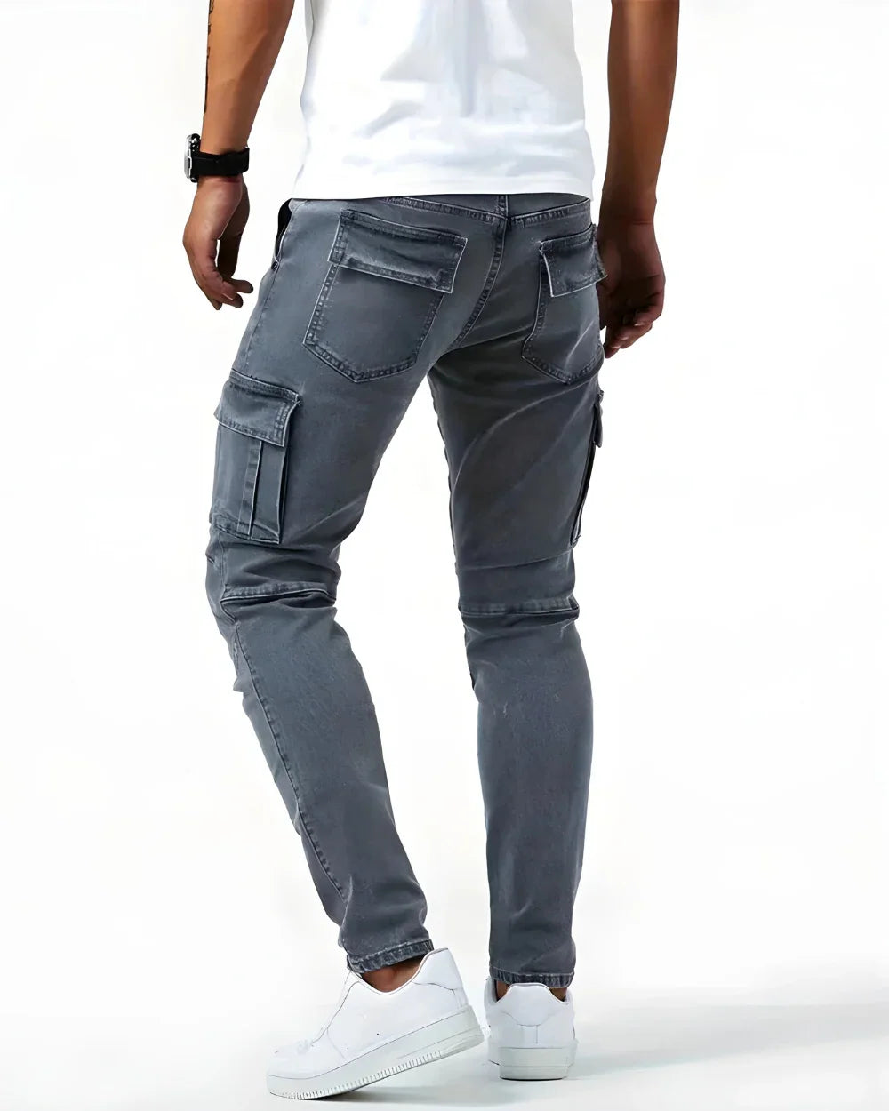 Dark gray elastic cargo jeans with back pocket flaps and side utility pockets