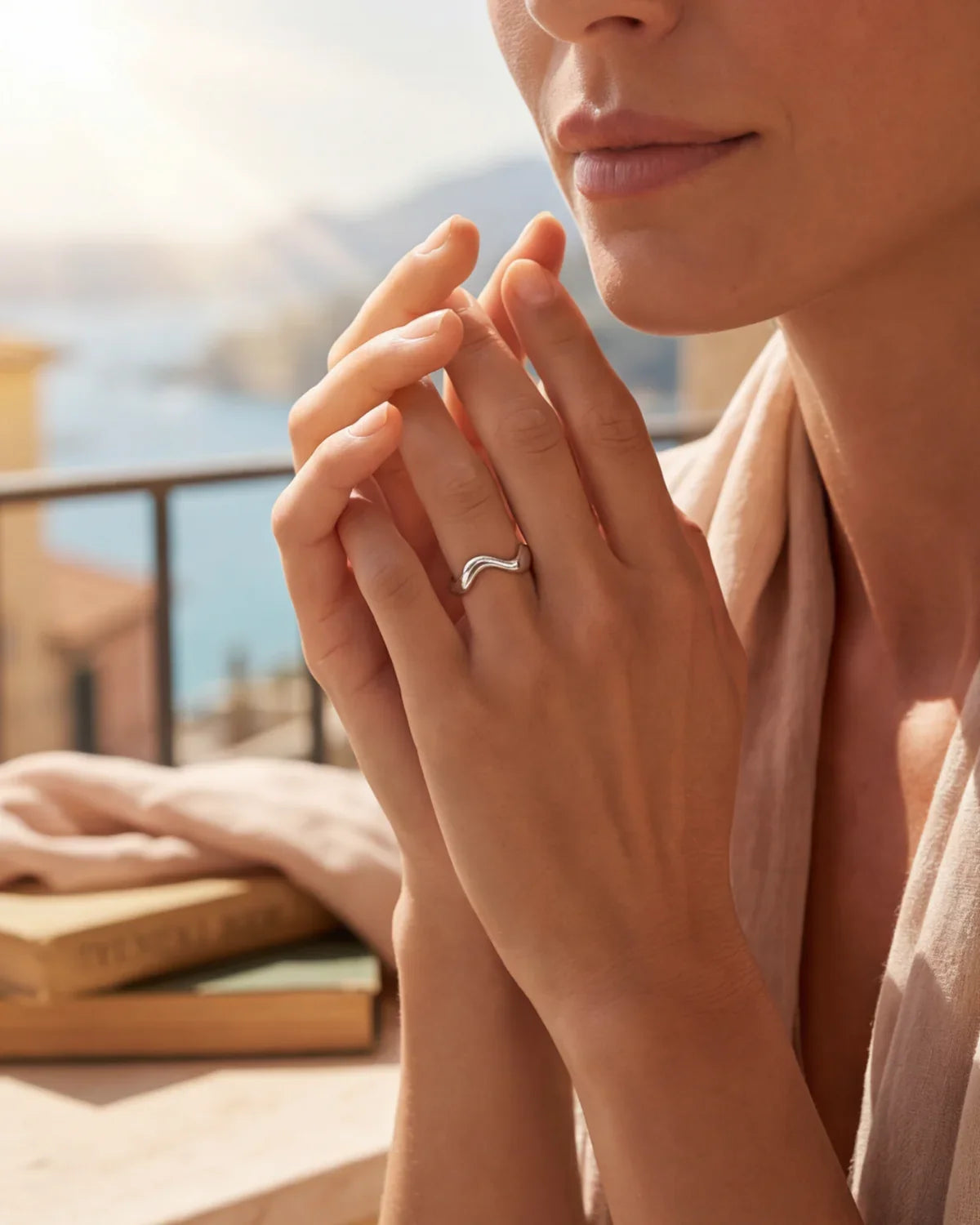 Silver wavy open-band ring on finger, adjustable size