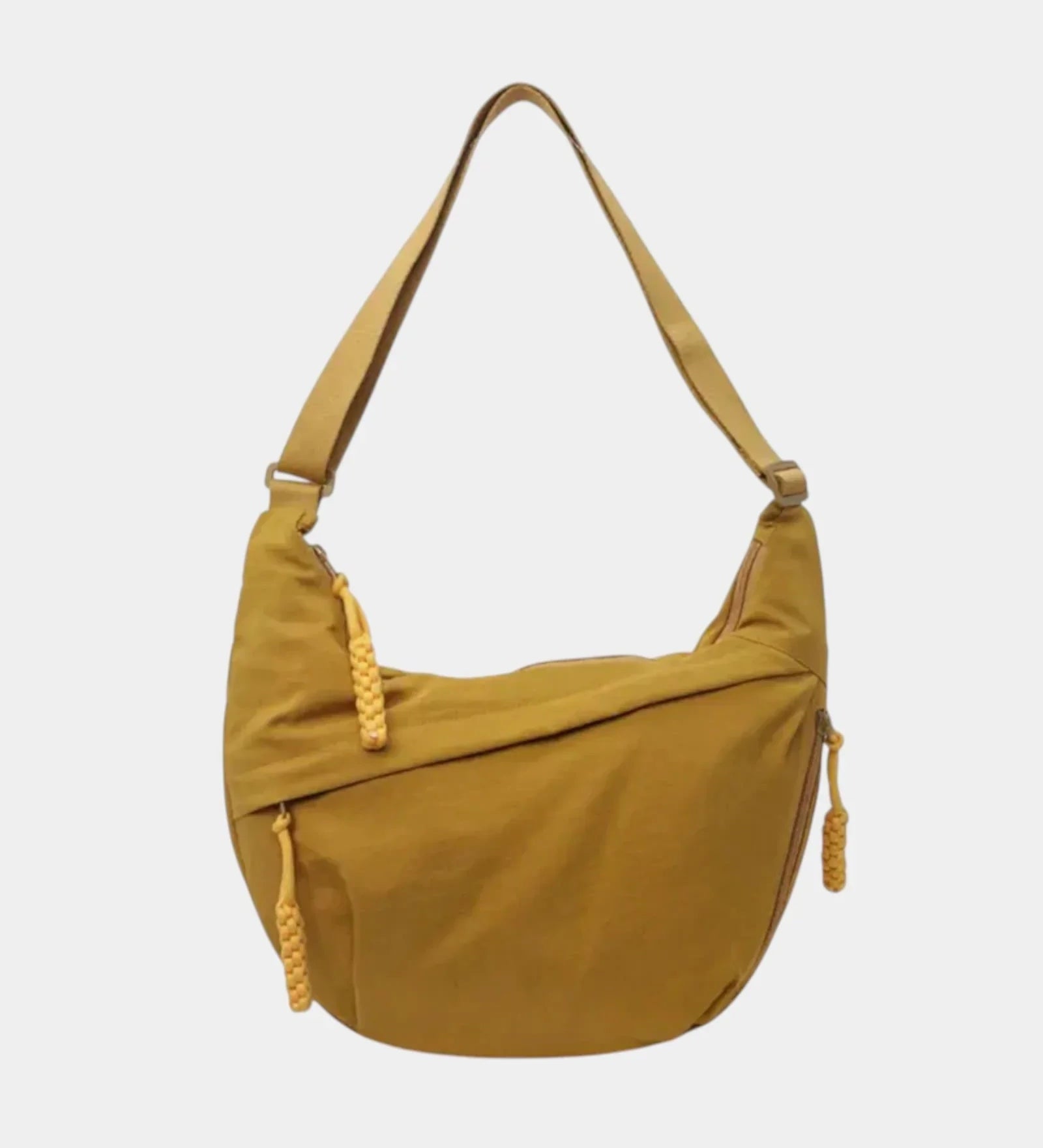 Yellow anti-theft crossbody bag with curved hobo shape, adjustable strap, and zipper detail.