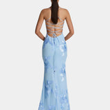 Backless maxi dress with crisscross straps and floral print