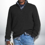 Black knit quarter-zip sweater with ribbed cuffs and hem.