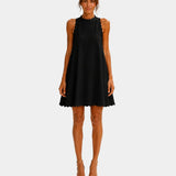 Black minimalist short dress, sleeveless high neck with scalloped hem
