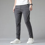 Men's charcoal slim-fit dress pants with zip fly and belt loops